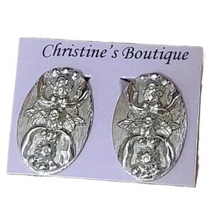 Ornate oval earrings by Whiting & Davis, vintage clip ons